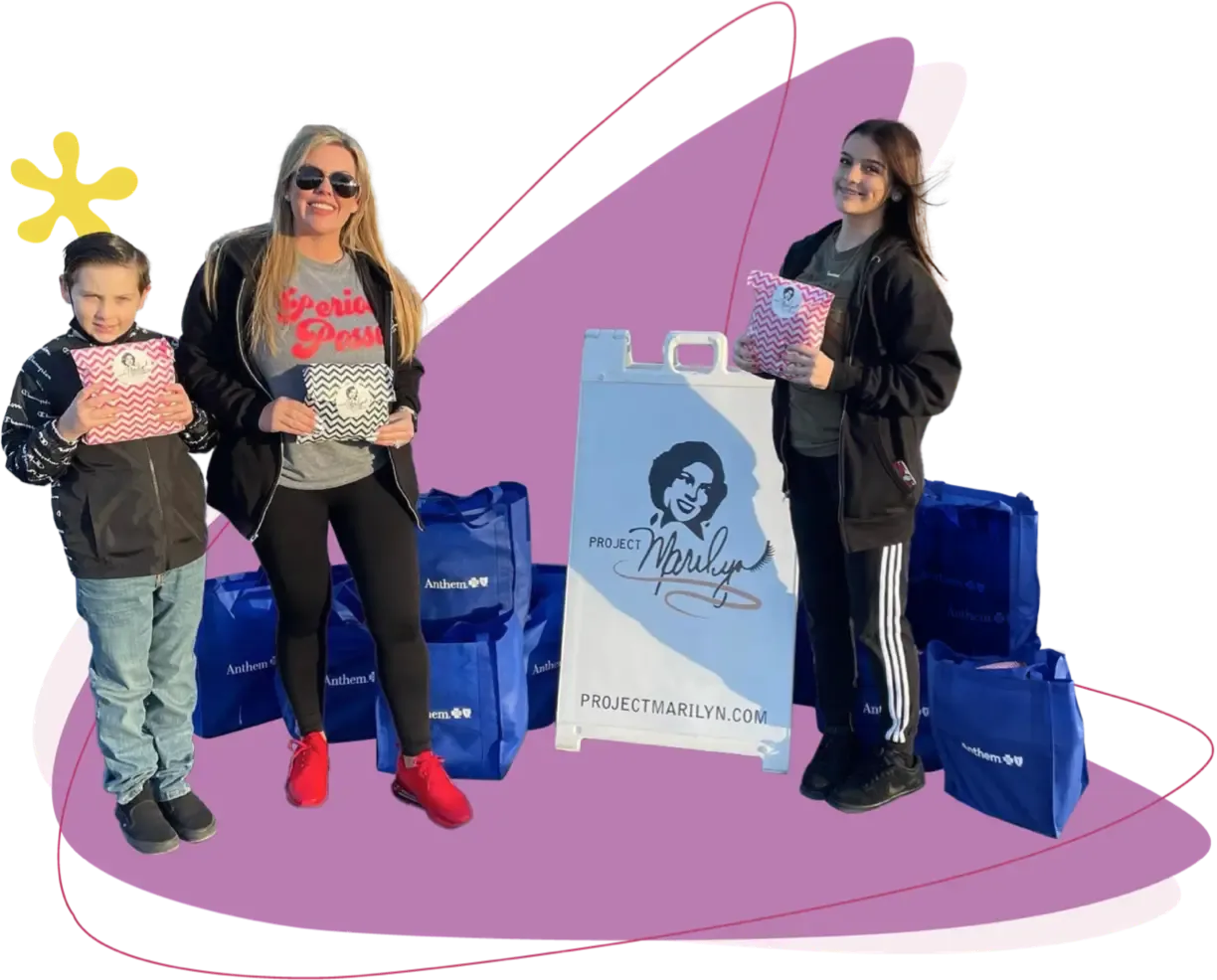 Image of a family volunteering for a Project Marilyn packing event 